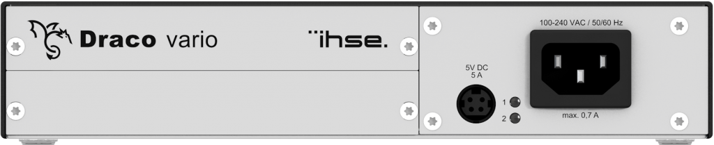 Close-up of Draco vario KVM extenders, showcasing multiple ports and indicators on a sleek, metallic chassis. High-performance video and data transmission.