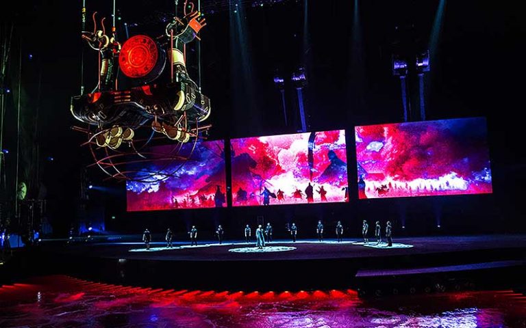 AV installations with colorful lighting, performers, and KVM systems