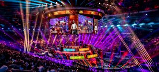 Live Legends eSports event with a vibrant stage and audience.