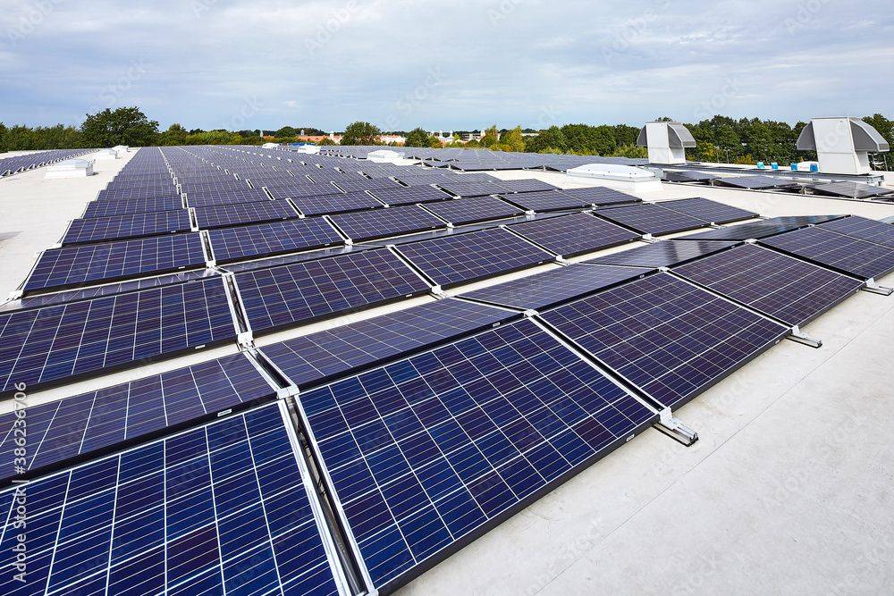 Solar panels on a IHSE headquarters roof highlighting sustainable energy practices - IHSE.
